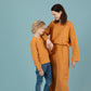 Mutter und Sohn im Partnerlook: Kindershirt Tencel in der Farbe Mango mit Knopfleiste, Gelb, Urheber: Mini & Eve